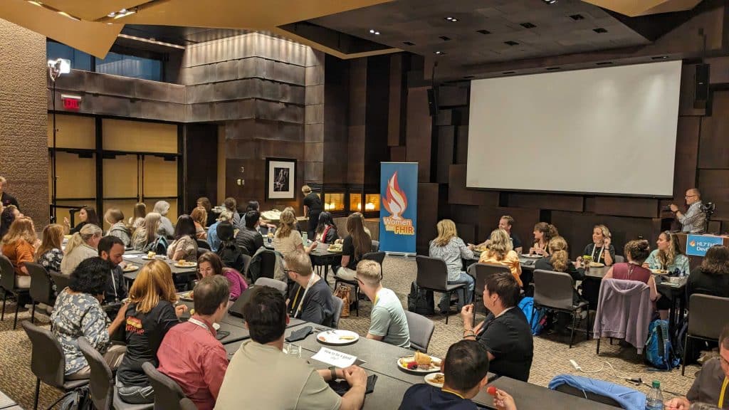 A room full of attendees at the DevDays Women for FHIR lunch.